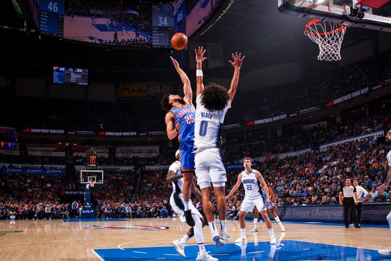 OKLAHOMA CITY, OK - NOVEMBER 4:  Ajay Mitchell #25 of the Oklahoma City Thunder shoots the ball during the game against the Orlando Magic on November 4, 2024 at Paycom Center in Oklahoma City, Oklahoma. NOTE TO USER: User expressly acknowledges and agrees that, by downloading and or using this photograph, User is consenting to the terms and conditions of the Getty Images License Agreement. Mandatory Copyright Notice: Copyright 2024 NBAE (Photo by Zach Beeker/NBAE via Getty Images)