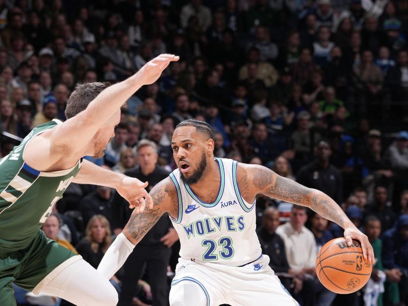 MINNEAPOLIS, MN -  FEBRUARY 23: Monte Morris #23 of the Minnesota Timberwolves dribbles the ball during the game against the Milwaukee Bucks on February 23, 2024 at Target Center in Minneapolis, Minnesota. NOTE TO USER: User expressly acknowledges and agrees that, by downloading and or using this Photograph, user is consenting to the terms and conditions of the Getty Images License Agreement. Mandatory Copyright Notice: Copyright 2024 NBAE (Photo by Jordan Johnson/NBAE via Getty Images)