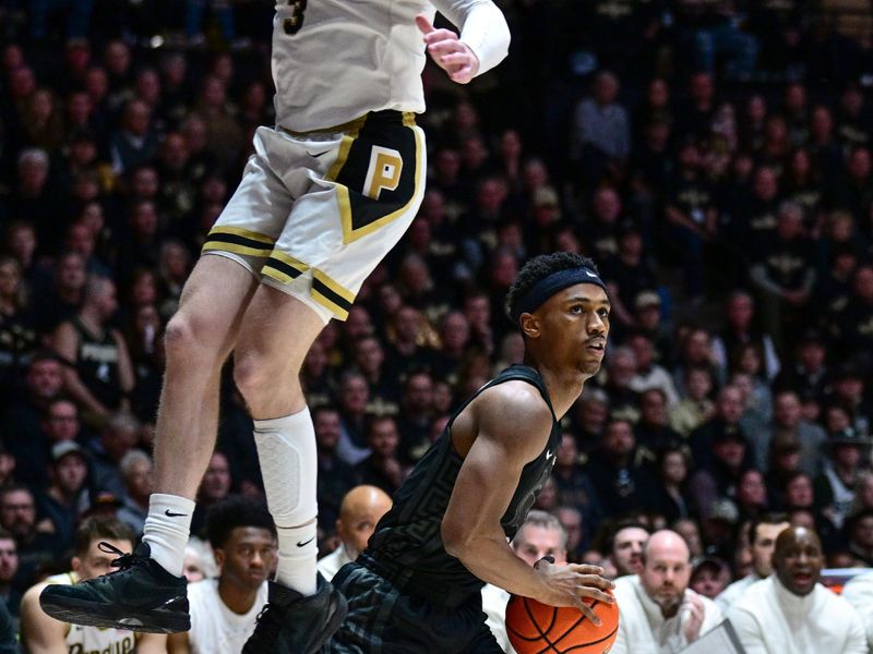 Mar 2, 2024; West Lafayette, Indiana, USA; Michigan State Spartans guard Tyson Walker (2) fakes out Purdue Boilermakers guard Braden Smith (3) during the first half at Mackey Arena. Mandatory Credit: Marc Lebryk-USA TODAY Sports