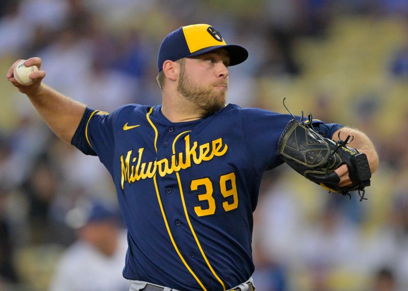 Aug 17, 2023; Los Angeles, California, USA;  Milwaukee Brewers starting pitcher Corbin Burnes (39) throws to the plate in the first inning against the Los Angeles Dodgers at Dodger Stadium. Mandatory Credit: Jayne Kamin-Oncea-USA TODAY Sports