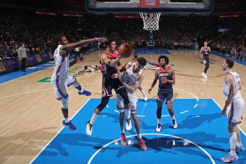 OKLAHOMA CITY, OK - FEBRUARY 23: Johnny Davis #1 of the Washington Wizards passes the ball during the game against the Oklahoma City Thunder on February 23, 2024 at Paycom Arena in Oklahoma City, Oklahoma. NOTE TO USER: User expressly acknowledges and agrees that, by downloading and or using this photograph, User is consenting to the terms and conditions of the Getty Images License Agreement. Mandatory Copyright Notice: Copyright 2024 NBAE (Photo by Zach Beeker/NBAE via Getty Images)