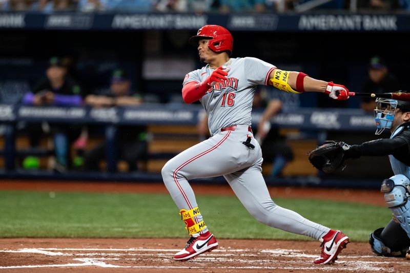 Jul 27, 2024; St. Petersburg, Florida, USA; Cincinnati Reds third base Noelvi Marte (16) hits the ball for a single against the Tampa Bay Rays during the third inning at Tropicana Field. Mandatory Credit: Matt Pendleton-USA TODAY Sports