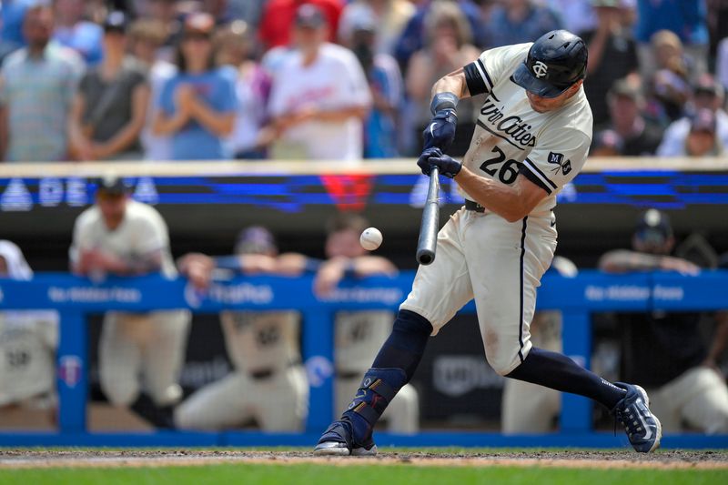 Jul 24, 2024; Minneapolis, Minnesota, USA;  Minnesota Twins outfielder Max Kepler (26) breaks his bat on a game-winning RBI single against the Philadelphia Phillies during the ninth inning at Target Field. Mandatory Credit: Nick Wosika-USA TODAY Sports