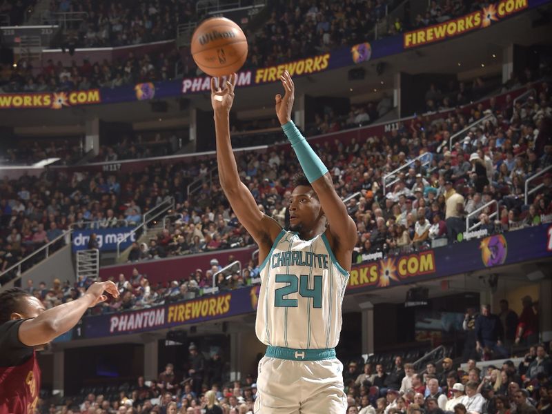 CLEVELAND, OH - JANUARY 5: Brandon Miller #24 of the Charlotte Hornets shoots a three point basket during the game against the Cleveland Cavaliers on January 5, 2025 at Rocket Mortgage FieldHouse in Cleveland, Ohio. NOTE TO USER: User expressly acknowledges and agrees that, by downloading and/or using this Photograph, user is consenting to the terms and conditions of the Getty Images License Agreement. Mandatory Copyright Notice: Copyright 2025 NBAE (Photo by David Liam Kyle/NBAE via Getty Images)