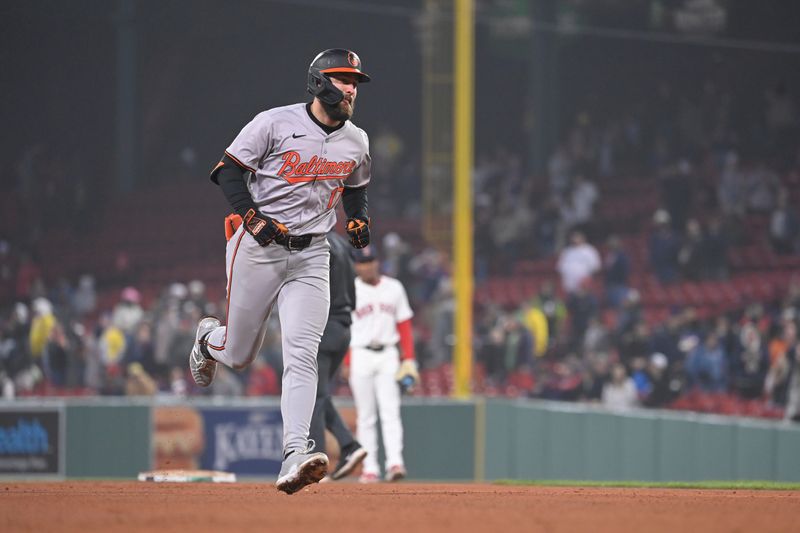 Apr 11, 20024; Boston, Massachusetts, USA; Baltimore Orioles left fielder Colton Cowser (17) runs the bases after hitting a home run during the tenth inning against the Boston Red Sox at Fenway Park. Mandatory Credit: Eric Canha-USA TODAY Sports