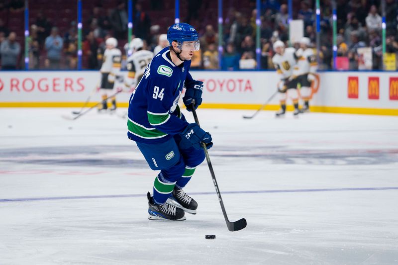 Nov 30, 2023; Vancouver, British Columbia, CAN; Vancouver Canucks forward Linus Karlsson (94) handles the puck during warm up prior to a game against the Vegas Golden Knights at Rogers Arena. Mandatory Credit: Bob Frid-USA TODAY Sports