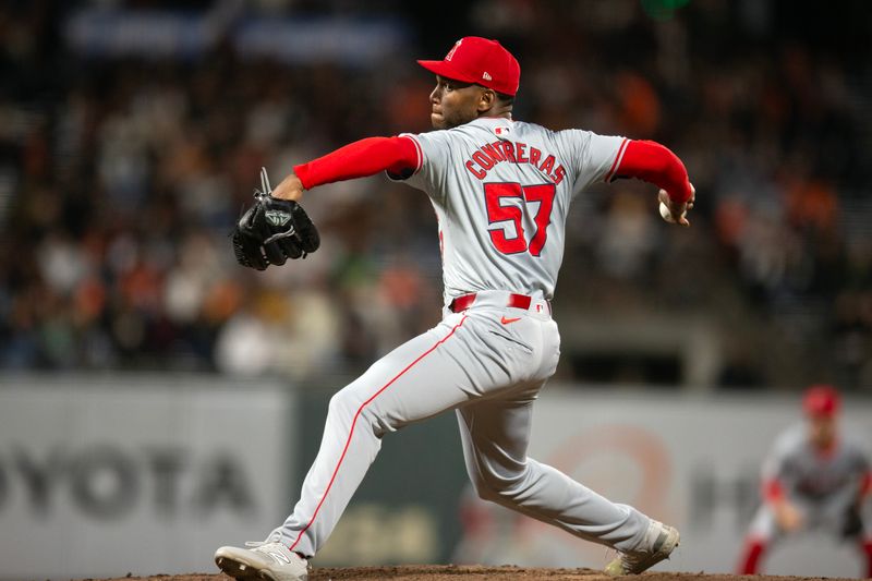 Jun 14, 2024; San Francisco, California, USA; Los Angeles Angels pitcher Roansy Contreras (57) delivers a pitch against the San Francisco Giants during the eighth inning at Oracle Park. Mandatory Credit: D. Ross Cameron-USA TODAY Sports