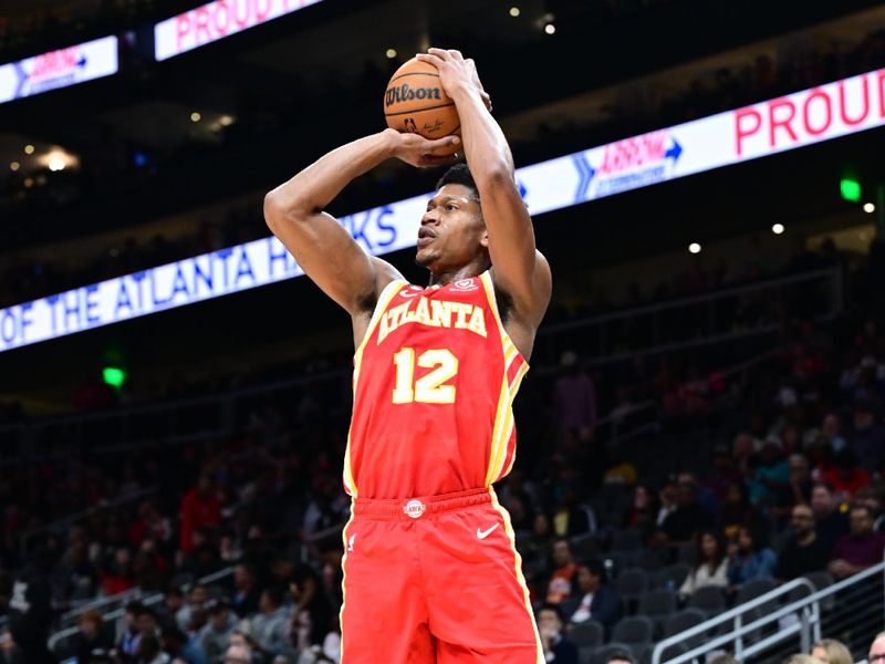 ATLANTA, GA - FEBRUARY 26: De'Andre Hunter #12 of the Atlanta Hawks shoots the ball during the game against the Brooklyn Nets on February 26, 2023 at State Farm Arena in Atlanta, Georgia.  NOTE TO USER: User expressly acknowledges and agrees that, by downloading and/or using this Photograph, user is consenting to the terms and conditions of the Getty Images License Agreement. Mandatory Copyright Notice: Copyright 2023 NBAE (Photo by Adam Hagy/NBAE via Getty Images)