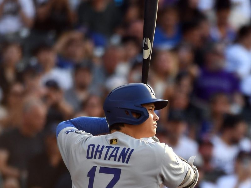 Jun 25, 2025; Denver, Colorado, USA; Los Angeles Dodgers two-way player Shohei Ohtani (17) during his at bat in the first inning against the Colorado Rockies at Coors Field. Mandatory Credit: Christopher Hanewinckel-Imagn Images