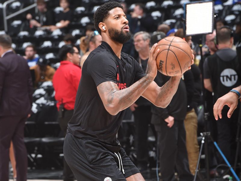 LOS ANGELES, CA - APRIL 23: Paul George #13 of the LA Clippers warms up before the game against the Dallas Mavericks during Round 1 Game 2 of the 2024 NBA Playoffs on April 23, 2024 at Crypto.Com Arena in Los Angeles, California. NOTE TO USER: User expressly acknowledges and agrees that, by downloading and/or using this Photograph, user is consenting to the terms and conditions of the Getty Images License Agreement. Mandatory Copyright Notice: Copyright 2024 NBAE (Photo by Andrew D. Bernstein/NBAE via Getty Images)