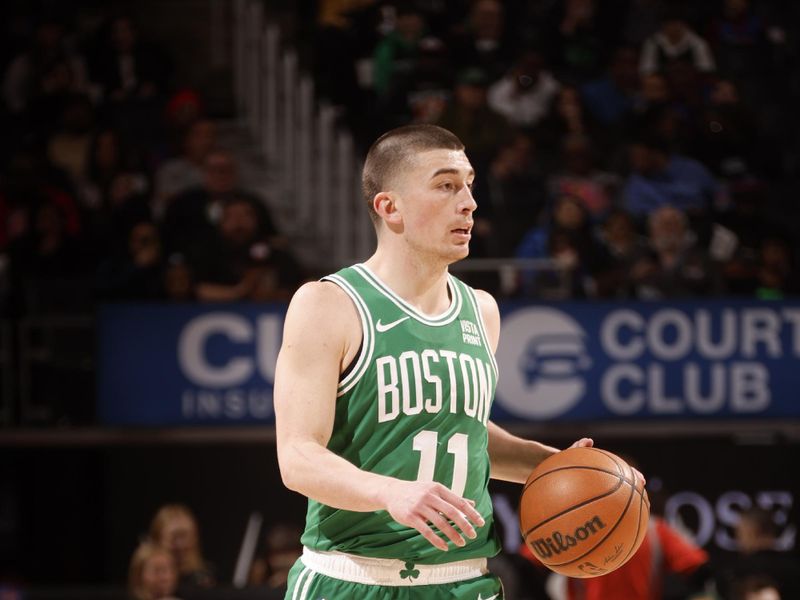 DETROIT, MI - MARCH 22: Payton Pritchard #11 of the Boston Celtics dribbles the ball during the game against the Detroit Pistons on March 22, 2024 at Little Caesars Arena in Detroit, Michigan. NOTE TO USER: User expressly acknowledges and agrees that, by downloading and/or using this photograph, User is consenting to the terms and conditions of the Getty Images License Agreement. Mandatory Copyright Notice: Copyright 2024 NBAE (Photo by Brian Sevald/NBAE via Getty Images)