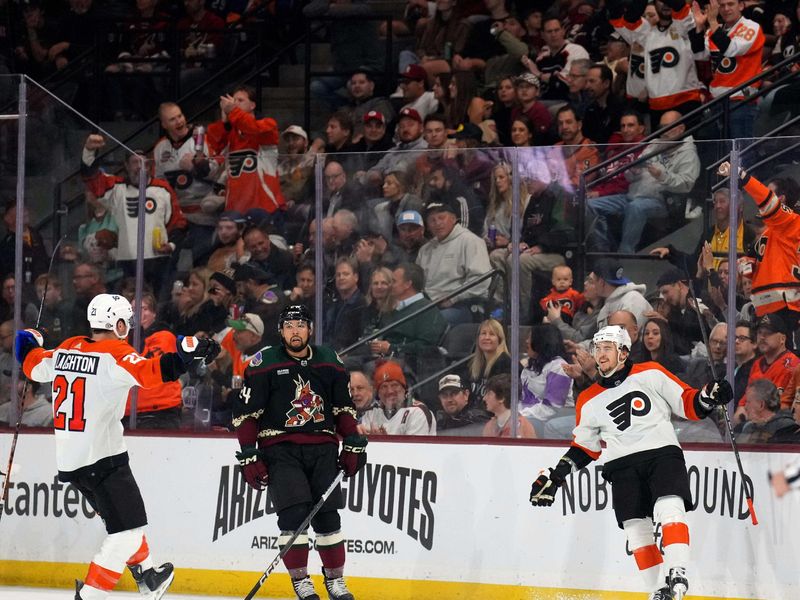 Dec 7, 2023; Tempe, Arizona, USA; Philadelphia Flyers right wing Travis Konecny (11) celebrates his goal against the Arizona Coyotes during the second period at Mullett Arena. Mandatory Credit: Joe Camporeale-USA TODAY Sports