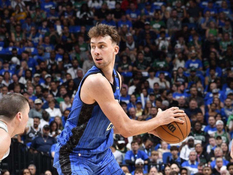 ORLANDO, FL - APRIL 25: Franz Wagner #22 of the Orlando Magic handles the ball during Round One, Game Three of the 2025 NBA Playoffs against the Boston Celtics on April 25, 2025 at Kia Center in Orlando, Florida. NOTE TO USER: User expressly acknowledges and agrees that, by downloading and or using this photograph, User is consenting to the terms and conditions of the Getty Images License Agreement. Mandatory Copyright Notice: Copyright 2025 NBAE (Photo by Fernando Medina/NBAE via Getty Images)