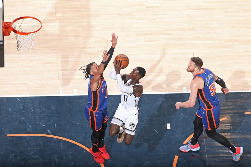 NEW YORK, NY - MARCH 23: Dennis Schroder #17 of the Brooklyn Nets shoots the ball during the game against the New York Knicks on March 23, 2024 at Madison Square Garden in New York City, New York.  NOTE TO USER: User expressly acknowledges and agrees that, by downloading and or using this photograph, User is consenting to the terms and conditions of the Getty Images License Agreement. Mandatory Copyright Notice: Copyright 2024 NBAE  (Photo by Nathaniel S. Butler/NBAE via Getty Images)