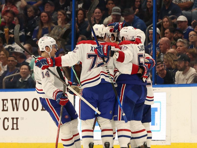 Mar 2, 2024; Tampa, Florida, USA; Montreal Canadiens right wing Josh Anderson (17) celebrates with teammates after scoring a goal against the Tampa Bay Lightning during the third period at Amalie Arena. Mandatory Credit: Kim Klement Neitzel-USA TODAY Sports