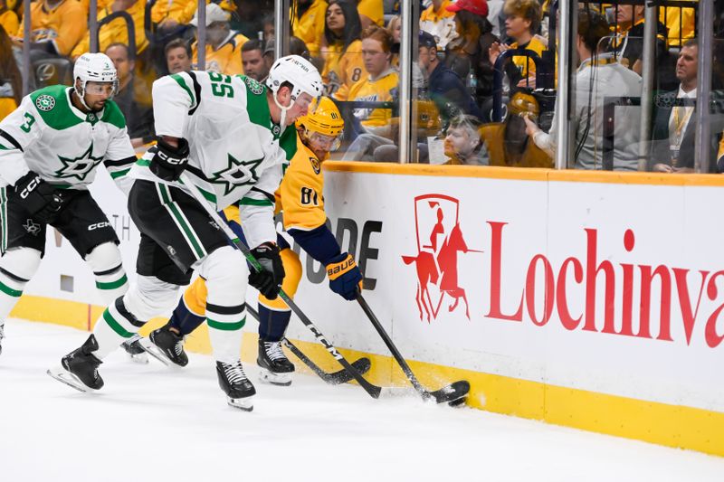 Oct 10, 2024; Nashville, Tennessee, USA; Dallas Stars defenseman Thomas Harley (55) steals the puck from Nashville Predators center Jonathan Marchessault (81) during the first period at Bridgestone Arena. Mandatory Credit: Steve Roberts-Imagn Images