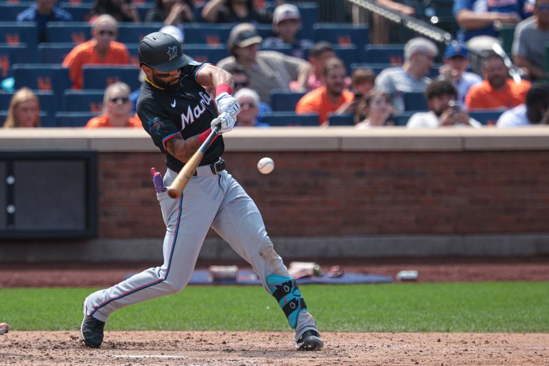 Aug 18, 2024; New York City, New York, USA; Miami Marlins left fielder Derek Hill (58) hits an RBI single during the eighth inning against the New York Mets at Citi Field. Mandatory Credit: Vincent Carchietta-USA TODAY Sports