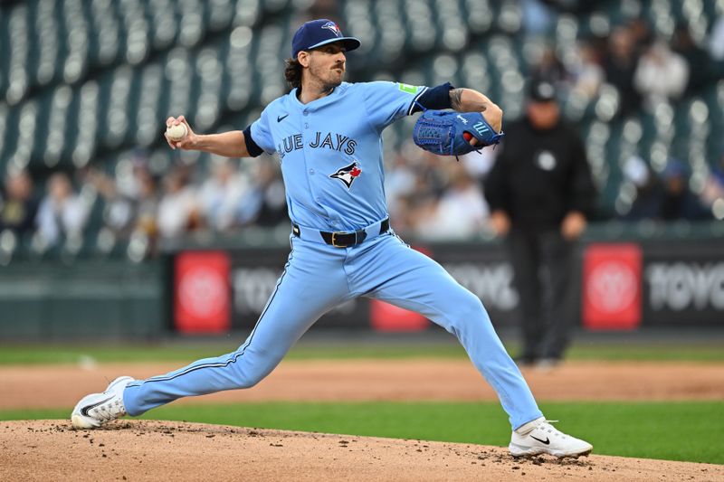 May 28, 2024; Chicago, Illinois, USA;  Toronto Blue Jays pitcher Kevin Gausman (34) pitches in the first inning against the Chicago White Sox at Guaranteed Rate Field. Mandatory Credit: Jamie Sabau-USA TODAY Sports