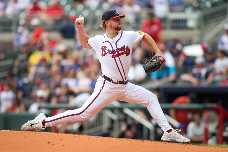 Sep 30, 2024; Atlanta, Georgia, USA; Atlanta Braves starting pitcher Spencer Schwellenbach (56) throws against the New York Mets in the second inning at Truist Park. Mandatory Credit: Brett Davis-Imagn Images

