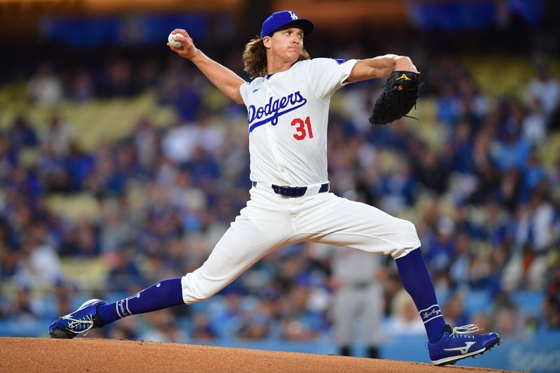 Apr 3, 2024; Los Angeles, California, USA; Los Angeles Dodgers starting pitcher Tyler Glasnow (31) throws against the San Francisco Giants during the first inning at Dodger Stadium. Mandatory Credit: Gary A. Vasquez-USA TODAY Sports