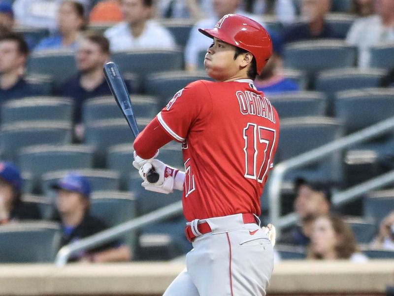 Aug 26, 2023; New York City, New York, USA;  Los Angeles Angels designated hitter Shohei Ohtani (17) hits a double in the first inning against the New York Mets at Citi Field. Mandatory Credit: Wendell Cruz-USA TODAY Sports