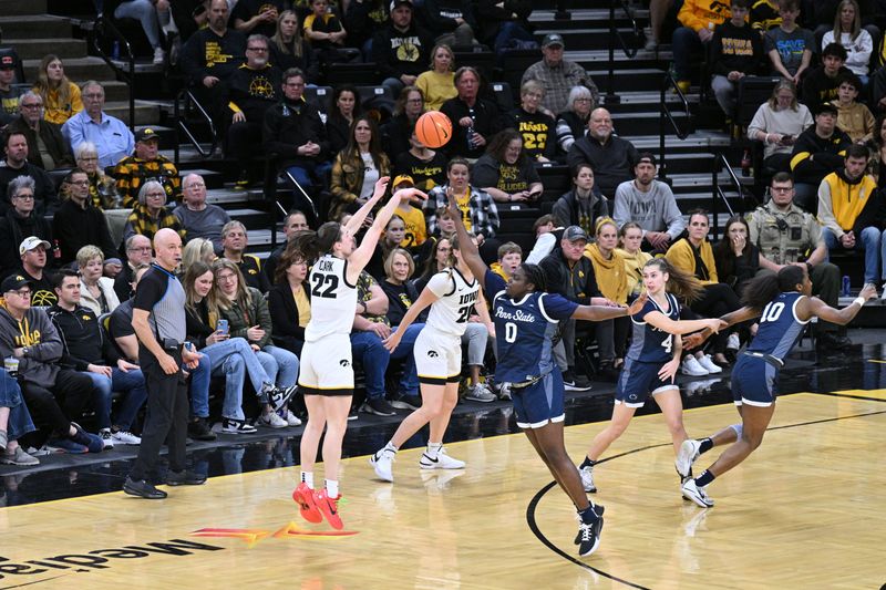 Feb 8, 2024; Iowa City, Iowa, USA; Iowa Hawkeyes guard Caitlin Clark (22) shoots a three point basket over Penn State Nittany Lions guard Leilani Kapinus (5) during the first half at Carver-Hawkeye Arena. Mandatory Credit: Jeffrey Becker-USA TODAY Sports