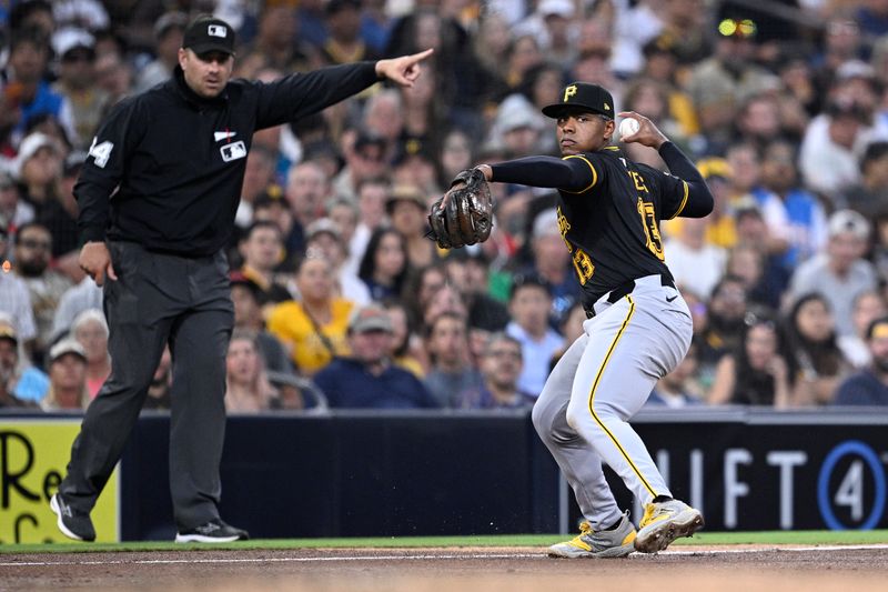 Aug 13, 2024; San Diego, California, USA; Pittsburgh Pirates third baseman Ke'Bryan Hayes (13) throws to first base during the third inning against the San Diego Padres at Petco Park. Mandatory Credit: Orlando Ramirez-USA TODAY Sports