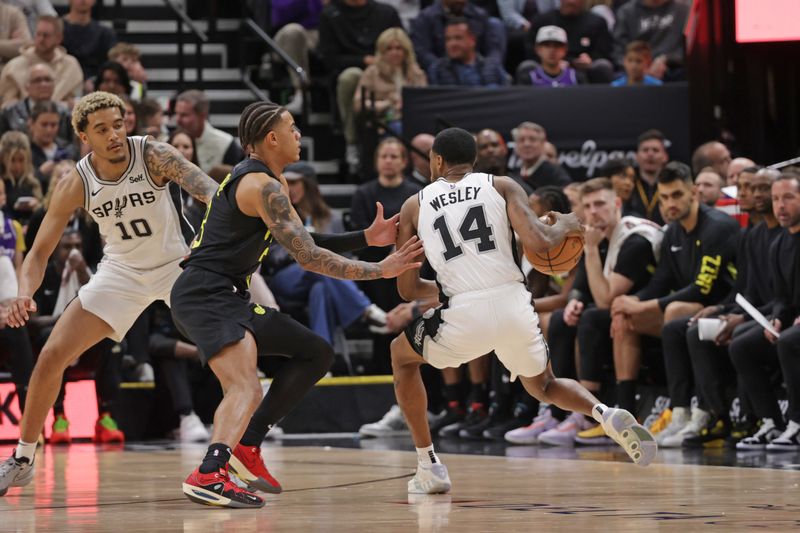 SALT LAKE CITY, UT - MARCH 27: Blake Wesley #14 of the San Antonio Spurs dribbles the ball during the game against the Utah Jazz on March 27, 2024 at Delta Center in Salt Lake City, Utah. NOTE TO USER: User expressly acknowledges and agrees that, by downloading and or using this Photograph, User is consenting to the terms and conditions of the Getty Images License Agreement. Mandatory Copyright Notice: Copyright 2024 NBAE (Photo by Chris Nicoll/NBAE via Getty Images)