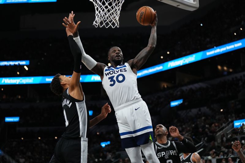 SAN ANTONIO, TX - NOVEMBER 2: Julius Randle #30 of the Minnesota Timberwolves drives to the basket during the game against the San Antonio Spurs on November 2, 2024 at the Frost Bank Center in San Antonio, Texas. NOTE TO USER: User expressly acknowledges and agrees that, by downloading and or using this photograph, user is consenting to the terms and conditions of the Getty Images License Agreement. Mandatory Copyright Notice: Copyright 2024 NBAE (Photos by Cooper Neill/NBAE via Getty Images)