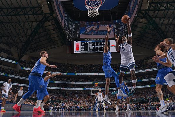 DALLAS, TX - DECEMBER 14: Anthony Edwards #5 of the Minnesota Timberwolves shoots the ball during the game against the Dallas Mavericks on December 14, 2023 at the American Airlines Center in Dallas, Texas. NOTE TO USER: User expressly acknowledges and agrees that, by downloading and or using this photograph, User is consenting to the terms and conditions of the Getty Images License Agreement. Mandatory Copyright Notice: Copyright 2023 NBAE (Photo by Glenn James/NBAE via Getty Images)