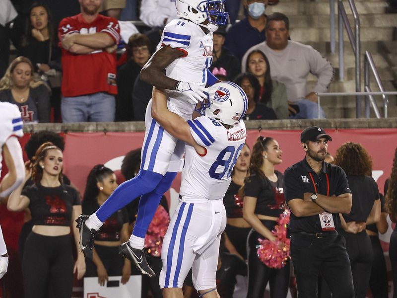 Oct 30, 2021; Houston, Texas, USA; Southern Methodist Mustangs wide receiver Rashee Rice (11) celebrates after scoring a touchdown during the second quarter against the Houston Cougars at TDECU Stadium. Mandatory Credit: Troy Taormina-USA TODAY Sports