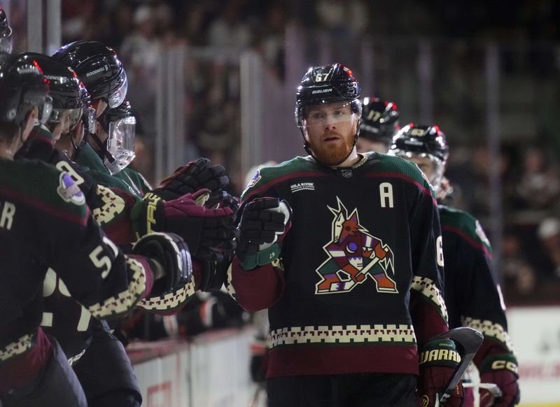 Dec 7, 2023; Tempe, Arizona, USA; Arizona Coyotes left wing Lawson Crouse (67) celebrates his goal against the Philadelphia Flyers during the first period at Mullett Arena. Mandatory Credit: Joe Camporeale-USA TODAY Sports