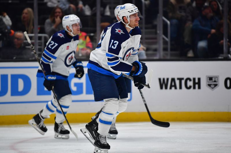 Dec 13, 2023; Los Angeles, California, USA; Winnipeg Jets center Gabriel Vilardi (13) celebrates his goal scored against the Los Angeles Kings during the third period at Crypto.com Arena. Mandatory Credit: Gary A. Vasquez-USA TODAY Sports