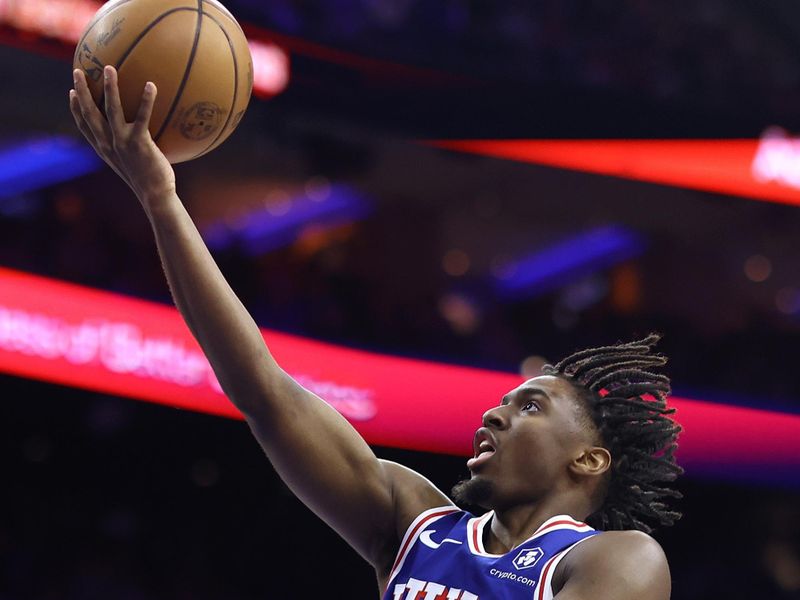 PHILADELPHIA, PENNSYLVANIA - APRIL 25: Tyrese Maxey #0 of the Philadelphia 76ers shoots a lay up during the third quarter against the New York Knicks during game three of the Eastern Conference First Round Playoffs at the Wells Fargo Center on April 25, 2024 in Philadelphia, Pennsylvania. NOTE TO USER: User expressly acknowledges and agrees that, by downloading and/or using this Photograph, user is consenting to the terms and conditions of the Getty Images License Agreement. (Photo by Tim Nwachukwu/Getty Images)