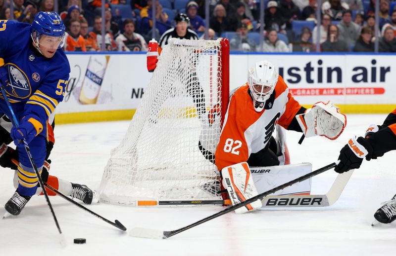 Apr 5, 2024; Buffalo, New York, USA;  Philadelphia Flyers goaltender Ivan Fedotov (82) watches as Buffalo Sabres left wing Jeff Skinner (53) looks to pass during the second period at KeyBank Center. Mandatory Credit: Timothy T. Ludwig-USA TODAY Sports