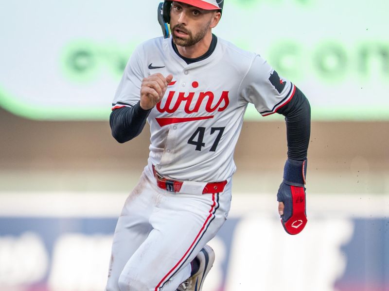 Apr 23, 2025; Minneapolis, Minnesota, USA; Chicago White Sox right fielder Joshua Palacios (47) heads to third base off a double from second base Luke Keaschall (15) against the Chicago White Sox in the first inning at Target Field. Mandatory Credit: Matt Blewett-Imagn Images