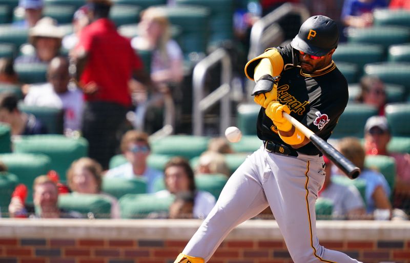 Sep 10, 2023; Cumberland, Georgia, USA; Pittsburgh Pirates right fielder Joshua Palacios (54) hits a triple against the Atlanta Braves during the seventh inning at Truist Park. Mandatory Credit: John David Mercer-USA TODAY Sports