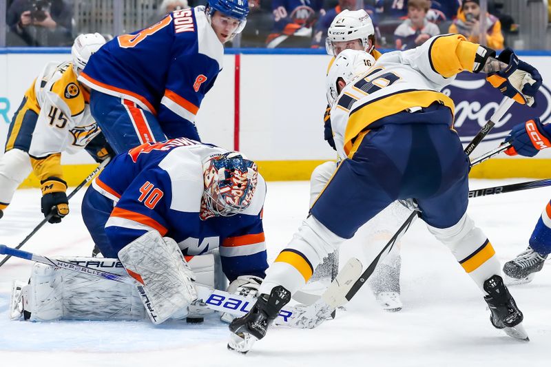 Apr 6, 2024; Elmont, New York, USA; New York Islanders goaltender Semyon Varlamov (40) makes a save against Nashville Predators left wing Jason Zucker (16) during the third period at UBS Arena. Mandatory Credit: Tom Horak-USA TODAY Sports