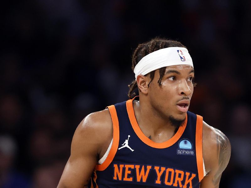 NEW YORK, NEW YORK - APRIL 04: Miles McBride #2 of the New York Knicks dribbles during the first half against the Sacramento Kings at Madison Square Garden on April 04, 2024 in New York City. NOTE TO USER: User expressly acknowledges and agrees that, by downloading and/or using this Photograph, user is consenting to the terms and conditions of the Getty Images License Agreement. (Photo by Sarah Stier/Getty Images)