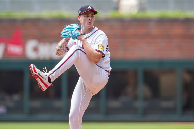 May 15, 2025; Cumberland, Georgia, USA; Atlanta Braves pitcher AJ Smith-Shawver (32) pitches against the Washington Nationals during the first inning at Truist Park. Mandatory Credit: Dale Zanine-Imagn Images