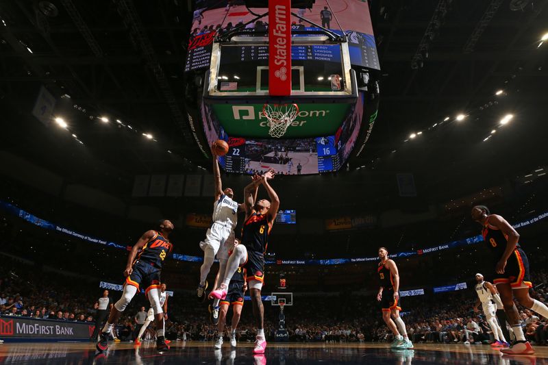 OKLAHOMA CITY, OK - APRIL 14: AJ Lawson #9 of the Dallas Mavericks shoots the ball during the game against the Oklahoma City Thunder on April 14, 2024 at Paycom Arena in Oklahoma City, Oklahoma. NOTE TO USER: User expressly acknowledges and agrees that, by downloading and or using this photograph, User is consenting to the terms and conditions of the Getty Images License Agreement. Mandatory Copyright Notice: Copyright 2024 NBAE (Photo by Zach Beeker/NBAE via Getty Images)