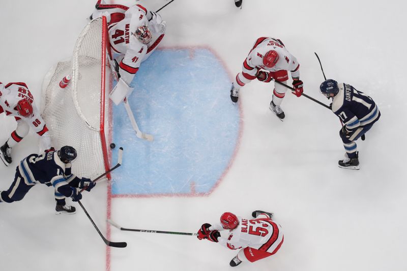 Apr 16, 2024; Columbus, Ohio, USA; Columbus Blue Jackets left wing Johnny Gaudreau (13) scores on a wraparound shot against the Carolina Hurricanes during the second period at Nationwide Arena. Mandatory Credit: Russell LaBounty-USA TODAY Sports