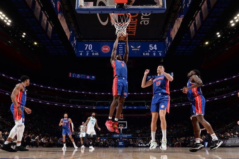 DETROIT, MI - MARCH 11: Jalen Duren #0 of the Detroit Pistons grabs a rebound during the game against the Charlotte Hornets  on March 11, 2024 at Little Caesars Arena in Detroit, Michigan. NOTE TO USER: User expressly acknowledges and agrees that, by downloading and/or using this photograph, User is consenting to the terms and conditions of the Getty Images License Agreement. Mandatory Copyright Notice: Copyright 2024 NBAE (Photo by Chris Schwegler/NBAE via Getty Images)