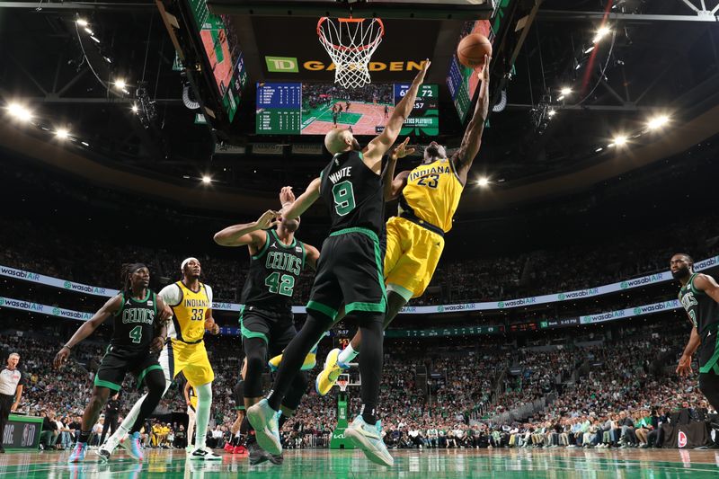 BOSTON, MA - MAY 23: Aaron Nesmith #23 of the Indiana Pacers drives to the basket during the game against the Boston Celtics during Game 2 of the Eastern Conference Finals of the 2024 NBA Playoffs on May 23, 2024 at the TD Garden in Boston, Massachusetts. NOTE TO USER: User expressly acknowledges and agrees that, by downloading and or using this photograph, User is consenting to the terms and conditions of the Getty Images License Agreement. Mandatory Copyright Notice: Copyright 2024 NBAE  (Photo by Nathaniel S. Butler/NBAE via Getty Images)