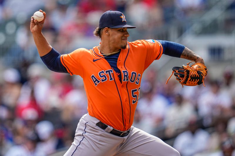 Apr 23, 2023; Cumberland, Georgia, USA; Houston Astros relief pitcher Bryan Abreu (52) pitches against the Atlanta Braves during the ninth inning at Truist Park. Mandatory Credit: Dale Zanine-USA TODAY Sports