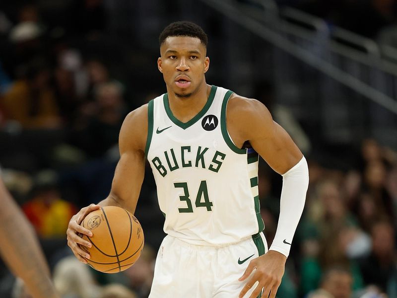 MILWAUKEE, WISCONSIN - OCTOBER 20: Giannis Antetokounmpo #34 of the Milwaukee Bucks dribbles up court during the second half of the preseason game against the Memphis Grizzlies at Fiserv Forum on October 20, 2023 in Milwaukee, Wisconsin. NOTE TO USER: User expressly acknowledges and agrees that, by downloading and or using this photograph, User is consenting to the terms and conditions of the Getty Images License Agreement. (Photo by John Fisher/Getty Images)