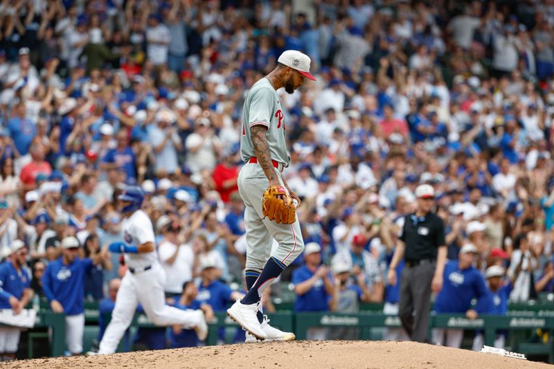 Jul 4, 2024; Chicago, Illinois, USA; Philadelphia Phillies starting pitcher Cristopher Sánchez (61) reacts after giving up a three-run home run to Chicago Cubs outfielder Ian Happ during the fourth inning at Wrigley Field. Mandatory Credit: Kamil Krzaczynski-USA TODAY Sports