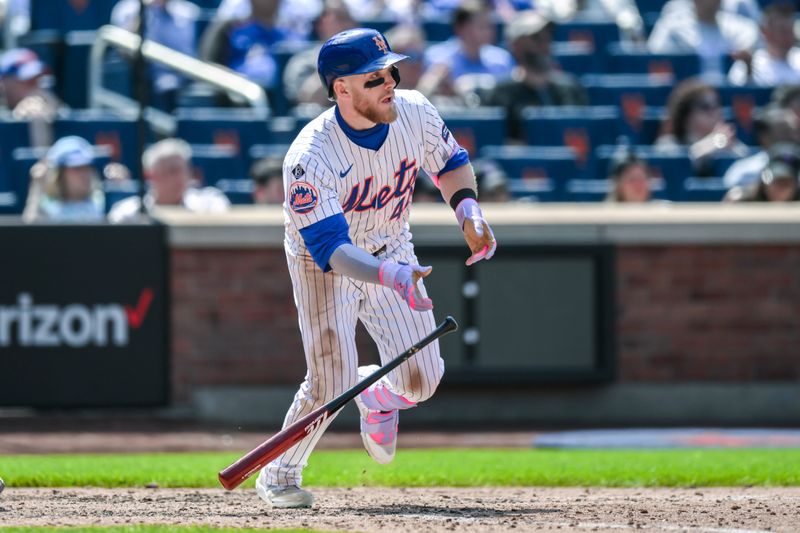 May 2, 2024; New York City, New York, USA; New York Mets outfielder Harrison Bader (44) hits a single against the Chicago Cubs during the sixth inning at Citi Field. Mandatory Credit: John Jones-USA TODAY Sports