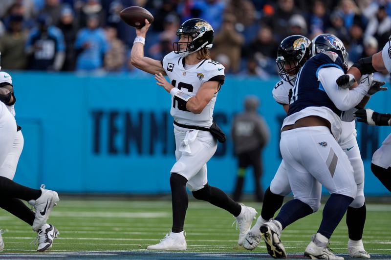 Jacksonville Jaguars quarterback Trevor Lawrence (16) throws a pass against the Tennessee Titans during the second half of an NFL football game Sunday, Jan. 7, 2024, in Nashville, Tenn. (AP Photo/George Walker IV)