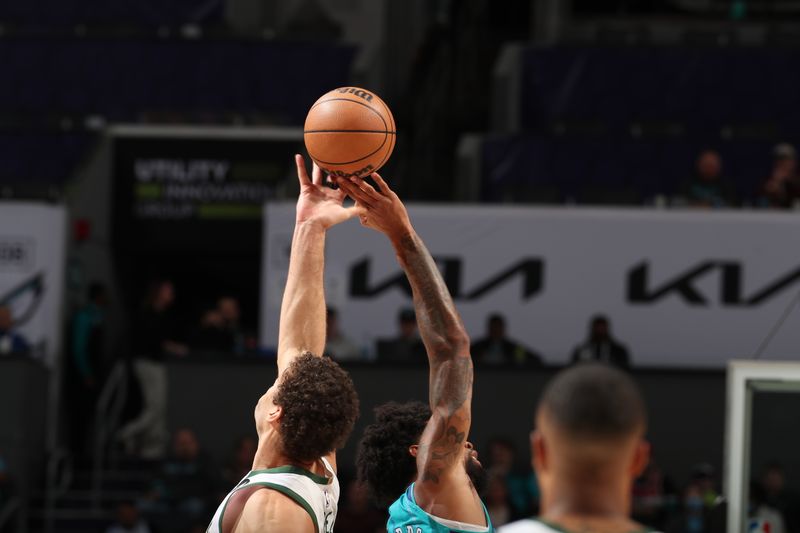 CHARLOTTE, NC - FEBRUARY 29: Brook Lopez #11 of the Milwaukee Bucks and Nick Richards #4 of the Charlotte Hornets go up for the opening tip off on February 29, 2024 at Spectrum Center in Charlotte, North Carolina. NOTE TO USER: User expressly acknowledges and agrees that, by downloading and or using this photograph, User is consenting to the terms and conditions of the Getty Images License Agreement. Mandatory Copyright Notice: Copyright 2024 NBAE (Photo by Kent Smith/NBAE via Getty Images)